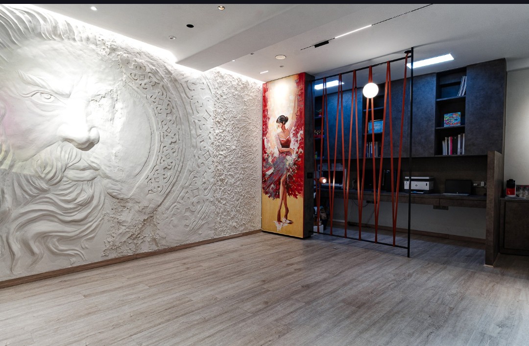 Illuminated sculptural Zeus wall and ballerina artwork in a contemporary interior
